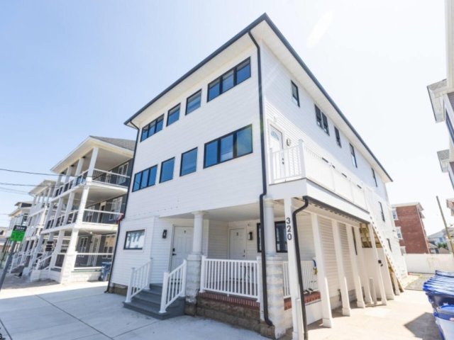 NEW CONSTRUCTION..JUST STEPS TO BEACH AND BOARDS!!